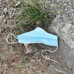 Discarded mask litters curb